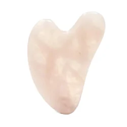 Rosenkvarts gua sha massagesten uden noget baggrund